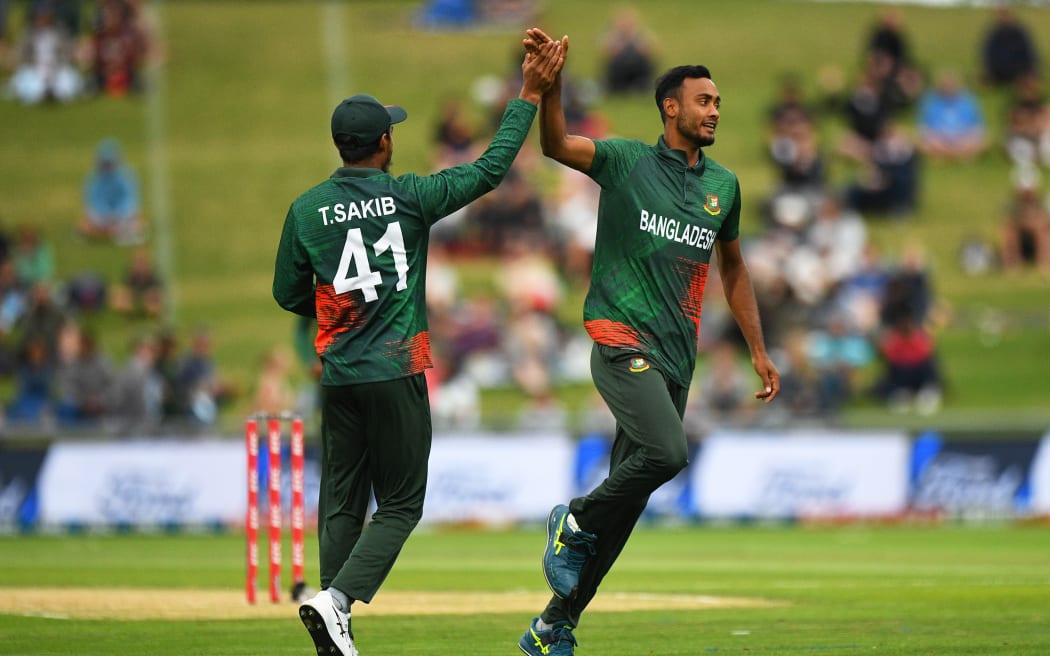 Bangladesh player Shoriful Islam celebrates a wicket during the first T20 international against the Black Caps in Napier.