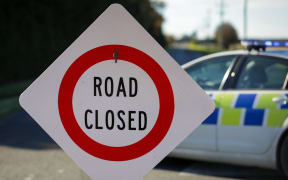 The scene of a crash where four people died after a truck and van collided near Ashburton.