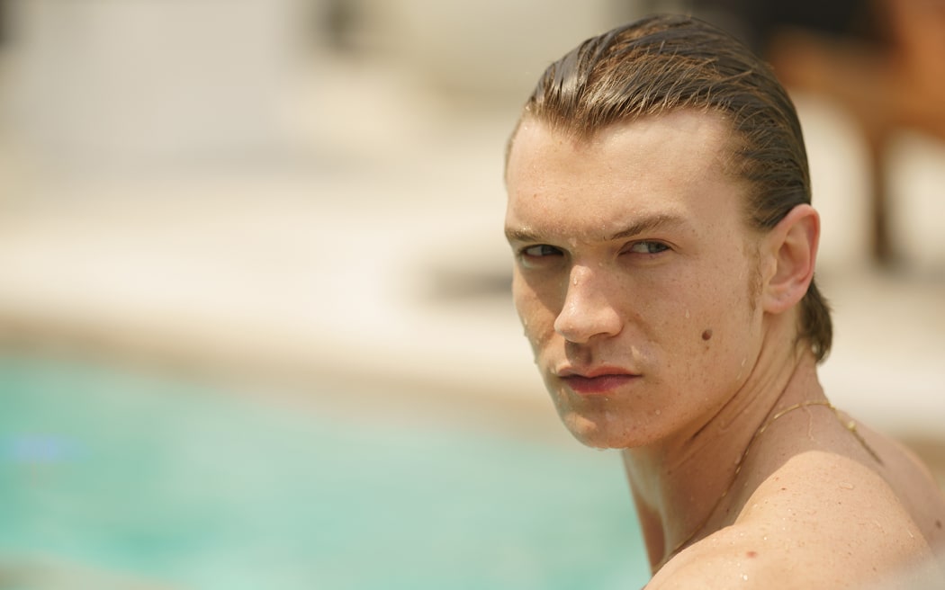 Scenes from season one of Heated Rivalry on Neon.