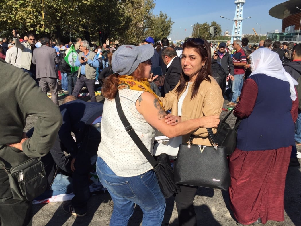 People at the site of the explosion.