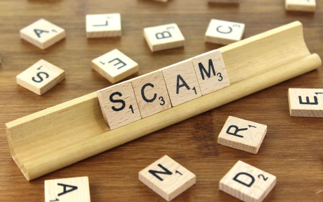 Scam spelled in scrabble
