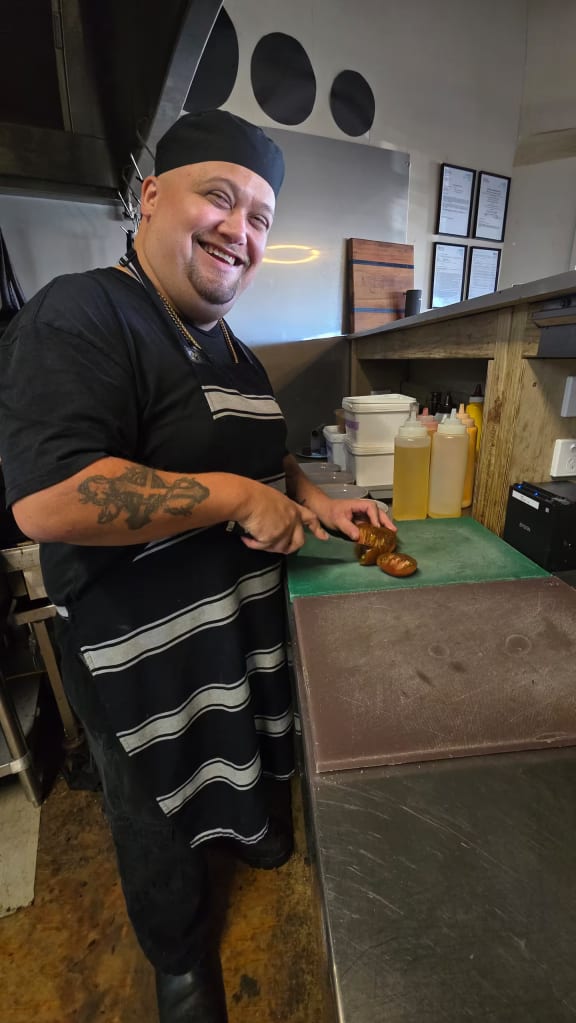 Head chef Jesse Moa at work in the kitchen.