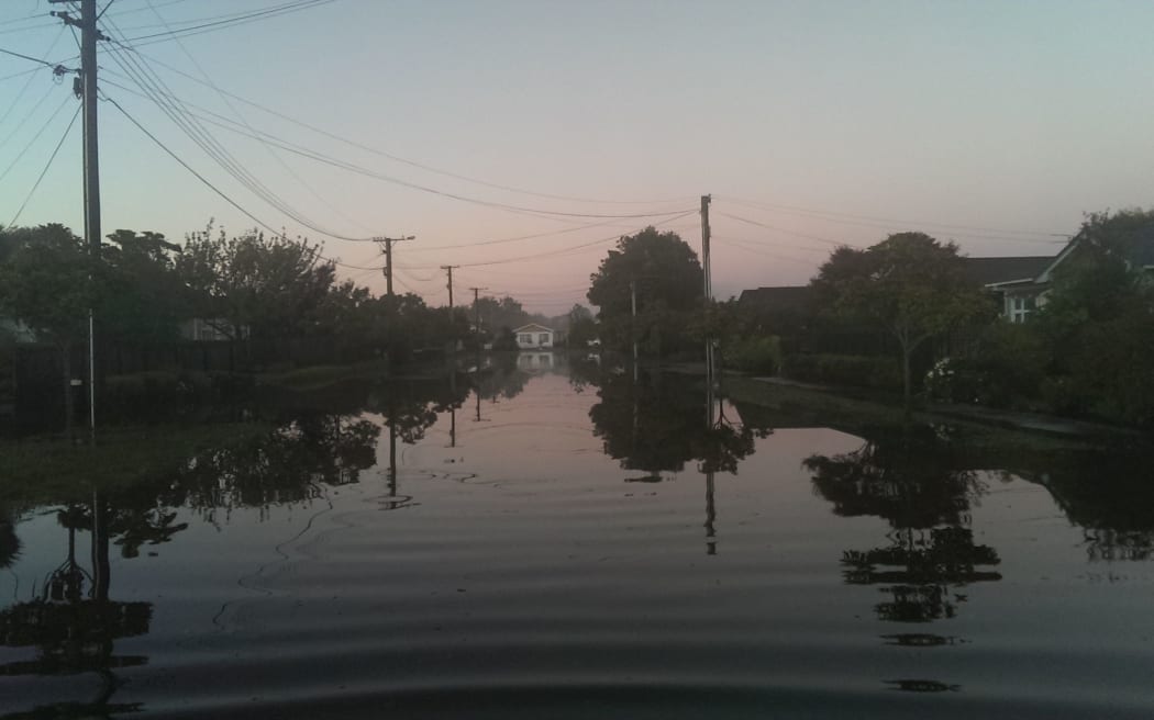 Roads were reopening on Thursday but floodwaters lingered in St Albans.