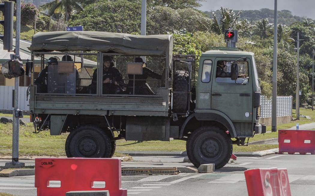 FILE - French gendarmes patrol the streets in Noumea, New Caledonia, on May, 16, 2024. Global nickel prices have soared since deadly violence erupted in the French Pacific territory of New Caledonia. (AP Photo/Cedric Jacquot, File)