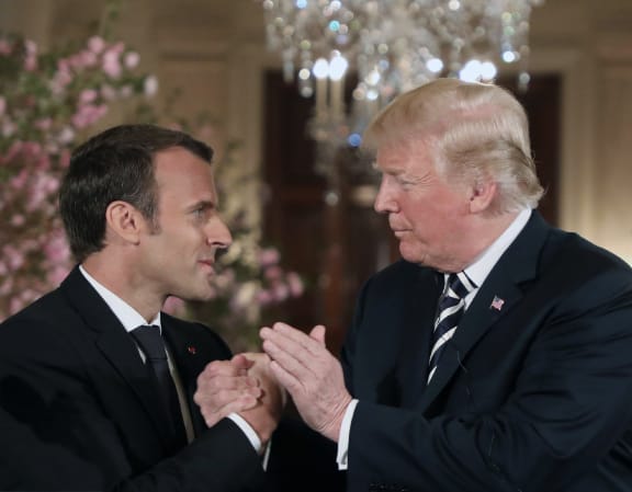 US President Donald Trump and French President Emmanuel Macron hold a joint press conference at the White House in Washington, DC, on April 24, 2018.