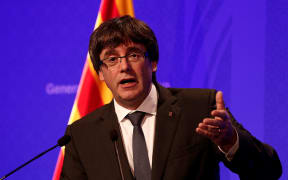 President of Catalonia Carles Puigdemont holds a press conference after a meeting with the members of the Catalan government