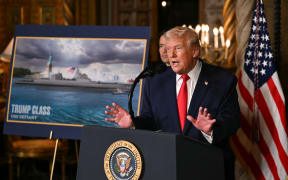 US Secretary of State Marco Rubio looks on as US President Donald Trump speaks after announcing the US Navy’s new Golden Fleet initiative, unveiling a new class of warships, at Mar-a-Lago in Palm Beach, Florida, on December 22, 2025. President Donald Trump on December 22 announced a new class of US warships that will be named after himself.
The Trump-class ships "will be the largest battleship in the history of our country, the largest battleship in the history of the world ever built," the president told journalists at his Mar-a-Lago residence in the US state of Florida. (Photo by ANDREW CABALLERO-REYNOLDS / AFP)