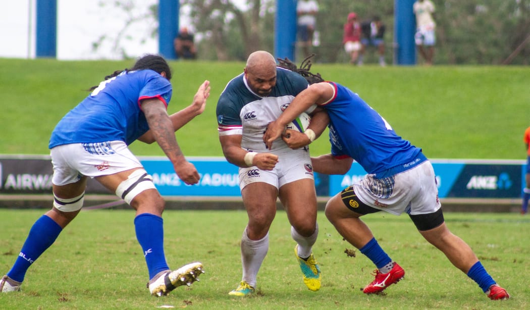 The USA take the ball up through the middle against Samoa in the second round of the World Rugby Pacific Nations Cup.