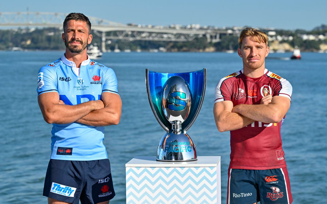 Captains photo with Super Rugby Pacific trophy, Jake Gordon of the Waratahs and Tate McDermott of the Reds.