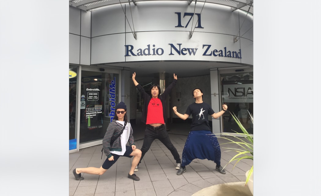 Birdstriking members Wen Yuzhen, Wang Xinjiu, and He Fan at RNZ's Auckland headquarters.