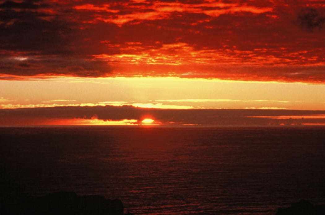 The Chatham Islands sunrise on the first morning of the year 2000. Sourced from Te Ara.