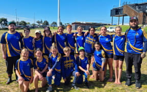 Matt Brown (left) with his Rip Rugby team from Otakiri School in the Eastern Bay of Plenty.