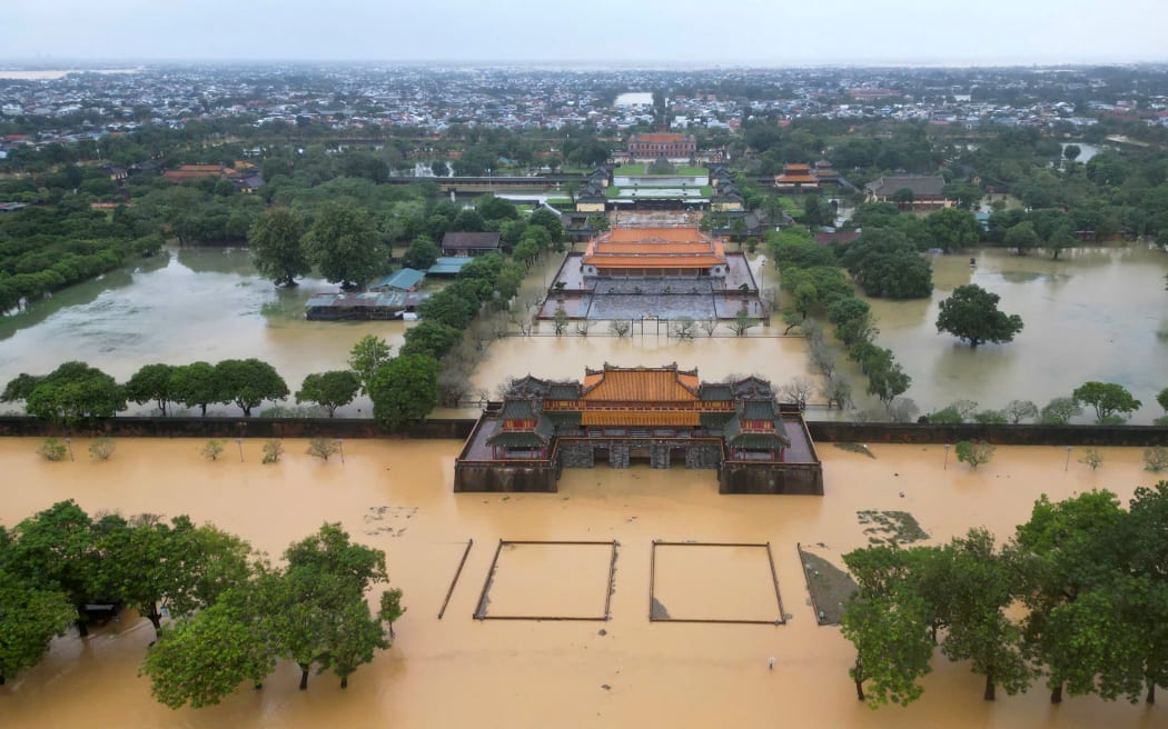 An aerial view shows floodwaters inundating the Imperial City in Hue on October 28, 2025. The central Vietnamese city of Hue recorded more than a metre of rainfall in a 24-hour period, smashing a national record set over two decades ago, the environment ministry said. (Photo by AFP)