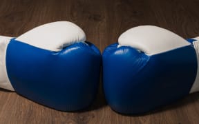 Boxer's professional outfit on a wooden background.