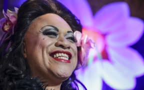 08082016. Photo Rebekah Parsons-King. Carmen Rupe lights light up green on multiple crossings down Cuba Street in Wellington. Borni Te Rongopai Tukiwhaho doubled as Carmen Rupe.