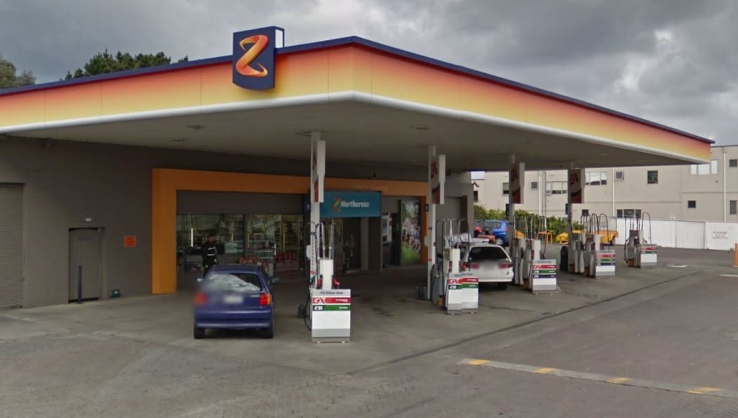 Two of the five men who broke into the petrol station using an axe are still on the run.