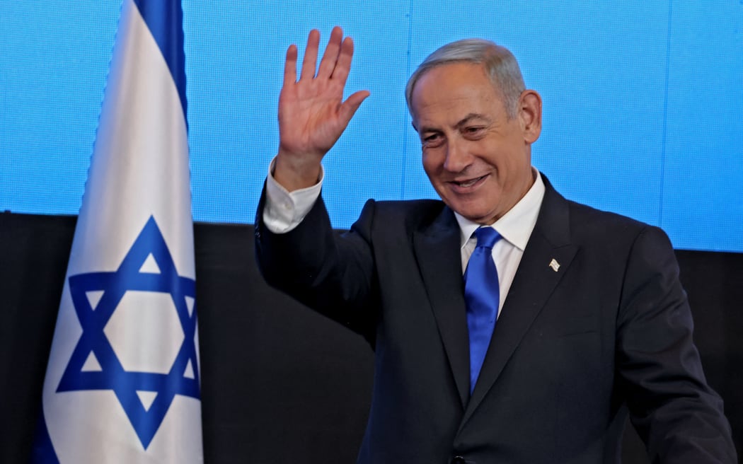 Israel's ex-premier and leader of the Likud party Benjamin Netanyahu addresses supporters at campaign headquarters in Jerusalem early on November 2, 2022, after the end of voting for national elections.