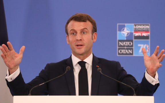 France's President Emmanuel Macron gives a press conference at the NATO summit at the Grove hotel in Watford, northeast of London on December 4, 2019. (Photo by LUDOVIC MARIN / AFP)