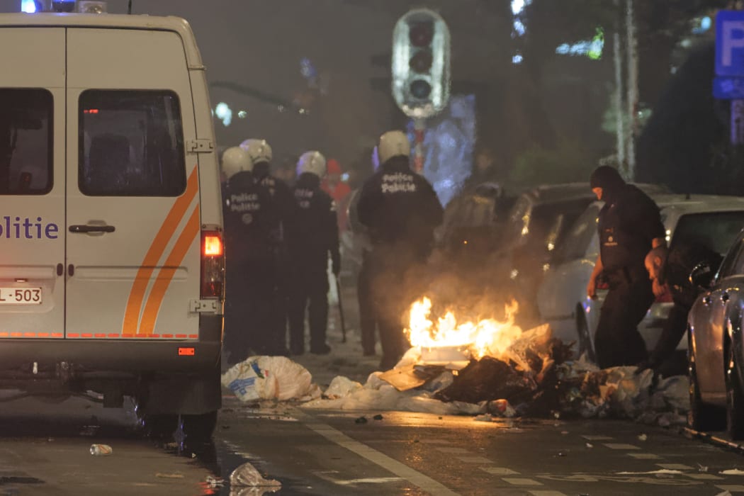 Crowds clashed with police in Brussels following Morocco's football win.