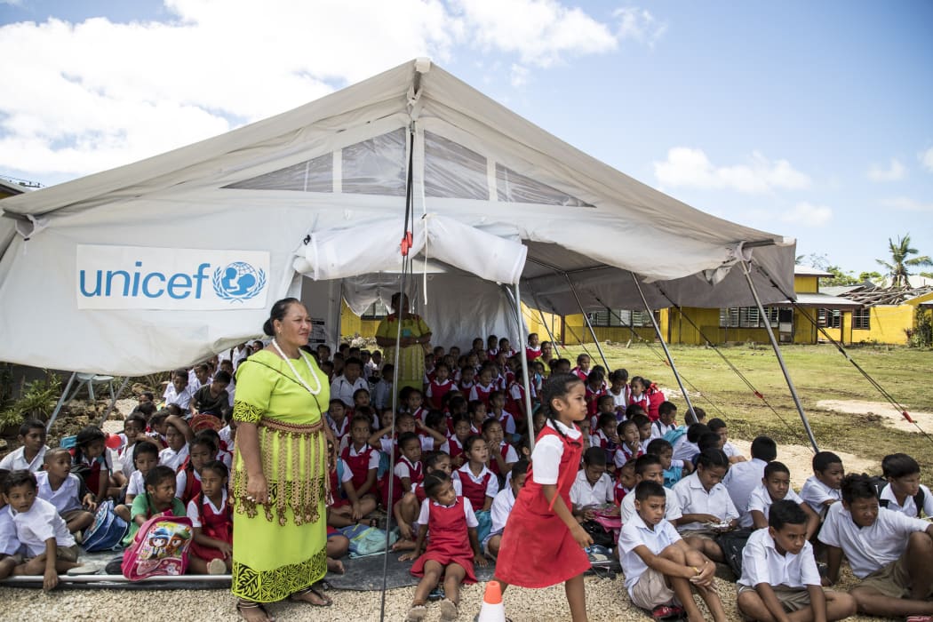 Tents are being used as temporary classrooms after the destruction of Cyclone Gita.