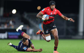 Crusaders' Chay Fihaki makes a run.