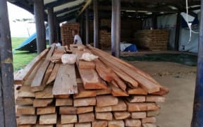 People on Koro Island are too desperate to wait for supplies and have cut wood from the forest themselves. There's enough here for 100 homes.