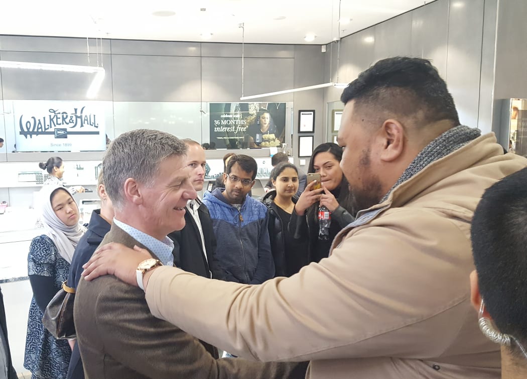 Bill English (centre) at Sylvia Park Mall in Auckland.