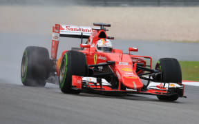 Ferrari's Sebastian Vettel on his way to winning Malaysian Grand Prix.