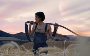 Still image from Zack Snyder's 2023 Netflix film, Rebel Moon: Part One – A Child of Fire featuring Sofia Boutella as Kora.