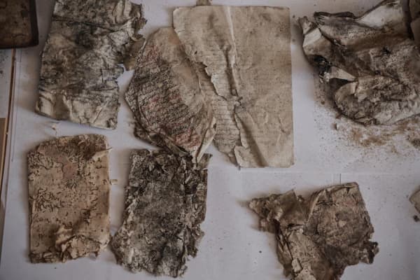 Damaged pages pulled from the debris of the Great Omari Mosque.