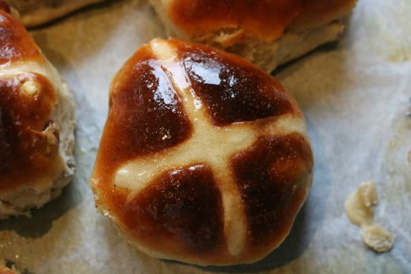 A delicious hot cross bun in close up