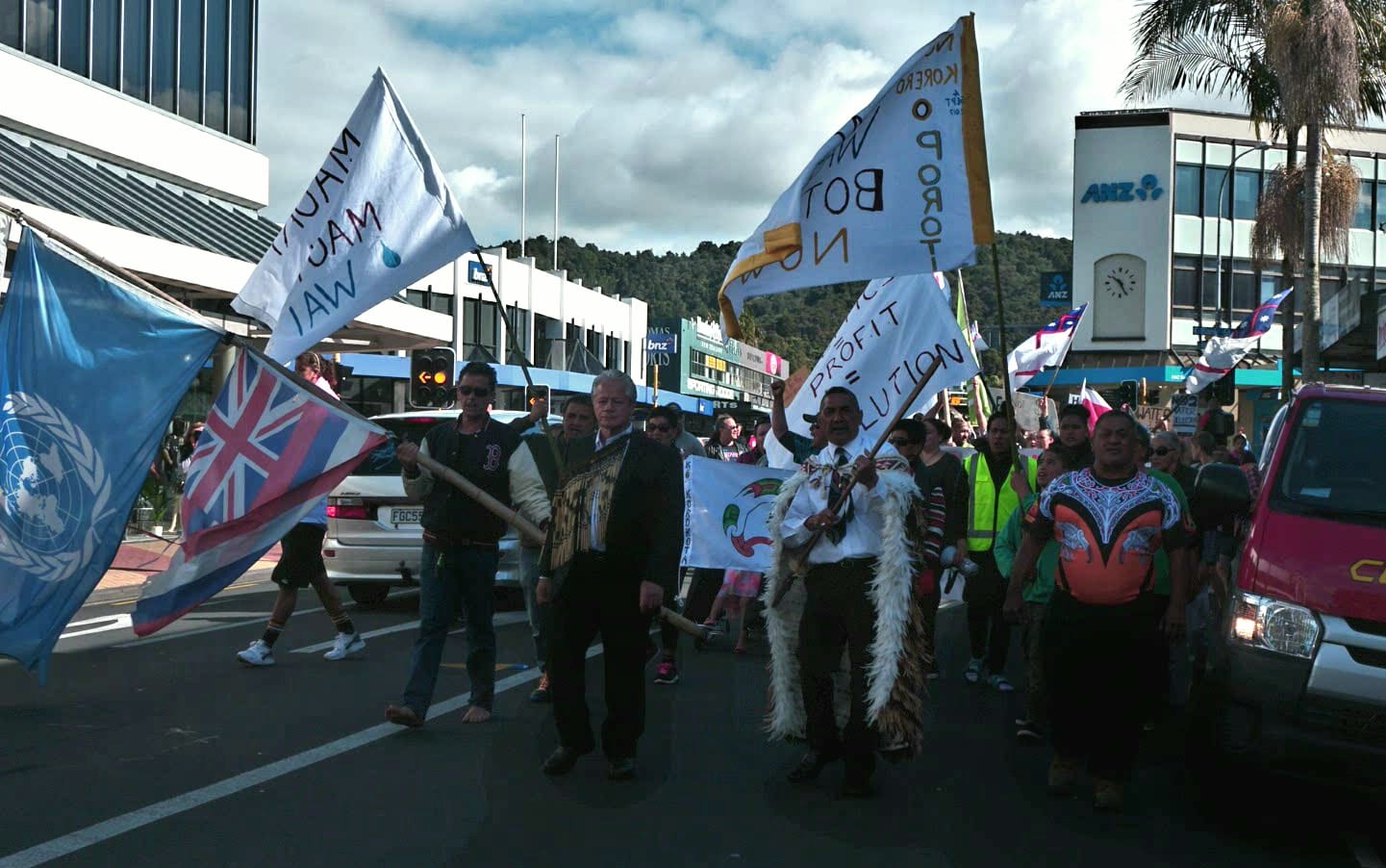 Protestors march through Whangarei to voice their disagreement with plans to allow Zodiac Holdings to build a water bottling factory at Porotī Springs.