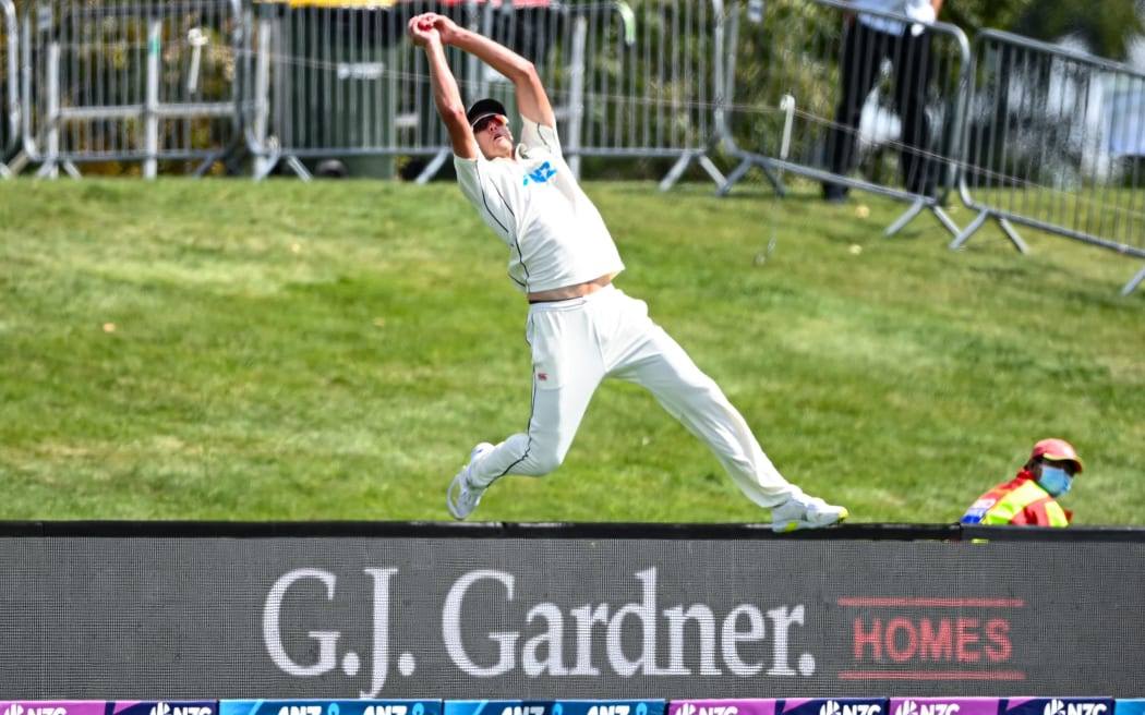 New Zealand's Kyle Jamieson fielding the ball