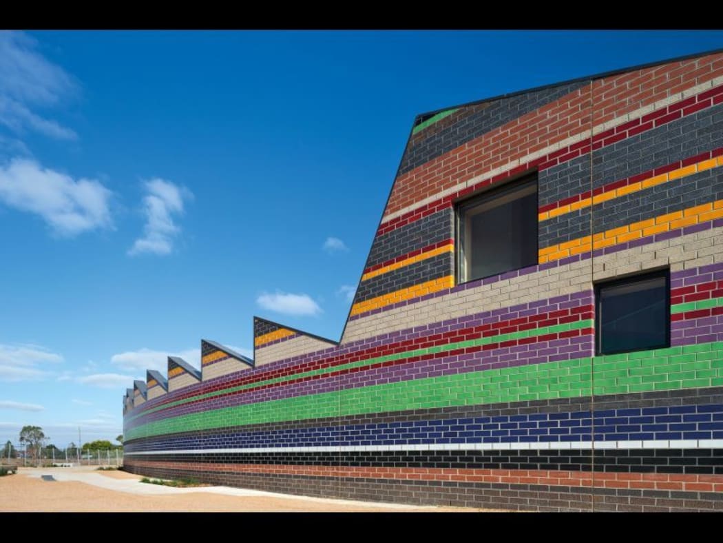 The couple also designed the brightly-coloured Dallas Brooks community primary school.
