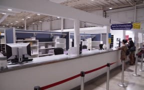 TAX CUTS: It was a slow morning at the Department of Revenue and Taxation Income Tax Processing Branch counter, Monday, Nov. 13. The local government could see business tax revenues drop if proposed federal tax cuts become law. David Castro/The Guam Daily Post