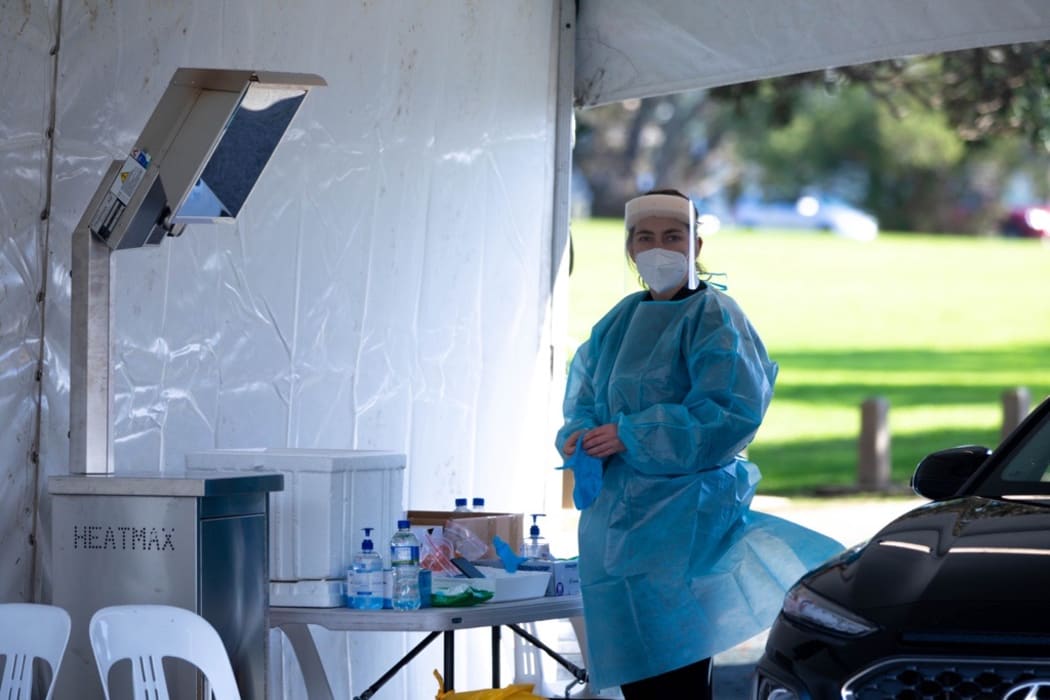 A health worker at the Devonport Covid-19 testing station.
