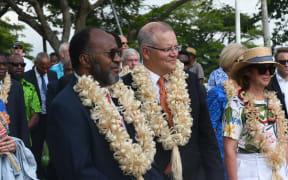 Scott Morrison with Carlot Salwai (left) during his visit to Vanuatu