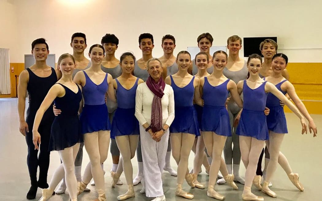 Victoria Simon (centre) with NZSD students
