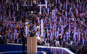 CHICAGO, ILLINOIS - AUGUST 20: Former first lady Michelle Obama speaks on stage during the second day of the Democratic National Convention at the United Center on August 20, 2024 in Chicago, Illinois. Delegates, politicians, and Democratic Party supporters are gathering in Chicago, as current Vice President Kamala Harris is named her party's presidential nominee. The DNC takes place from August 19-22.   Joe Raedle/Getty Images/AFP (Photo by JOE RAEDLE / GETTY IMAGES NORTH AMERICA / Getty Images via AFP)