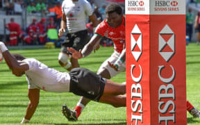 Fiji captain Osea Kolinisau scores against Kenya