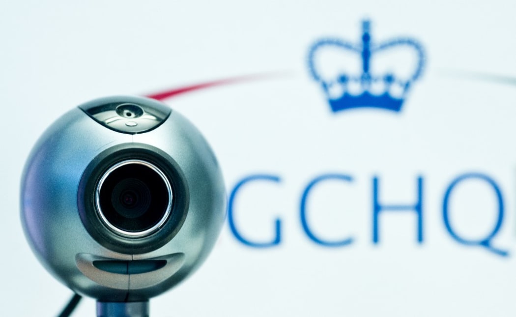 ILLUSTRATION - An illustration shows a webcam in front of the logo of the British intelligence agency Government Communications Headquarters (GCHQ) in Berlin, Germany, 28 February 2014.