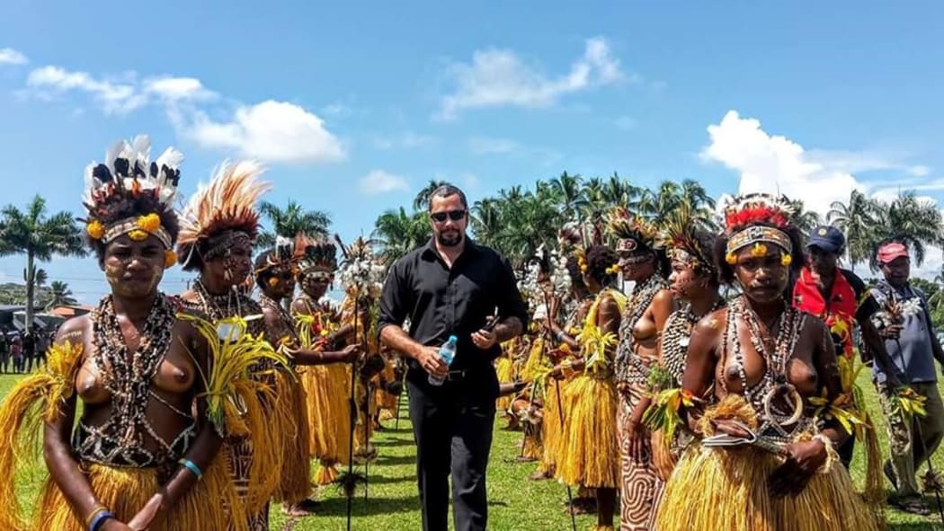 The Governor of Papua New Guinea's Oro Province, Gary Juffa (centre)