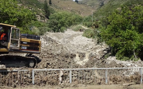 Rocks and debris blocked Reservoir Creek and a concrete culvert in Roxburgh
