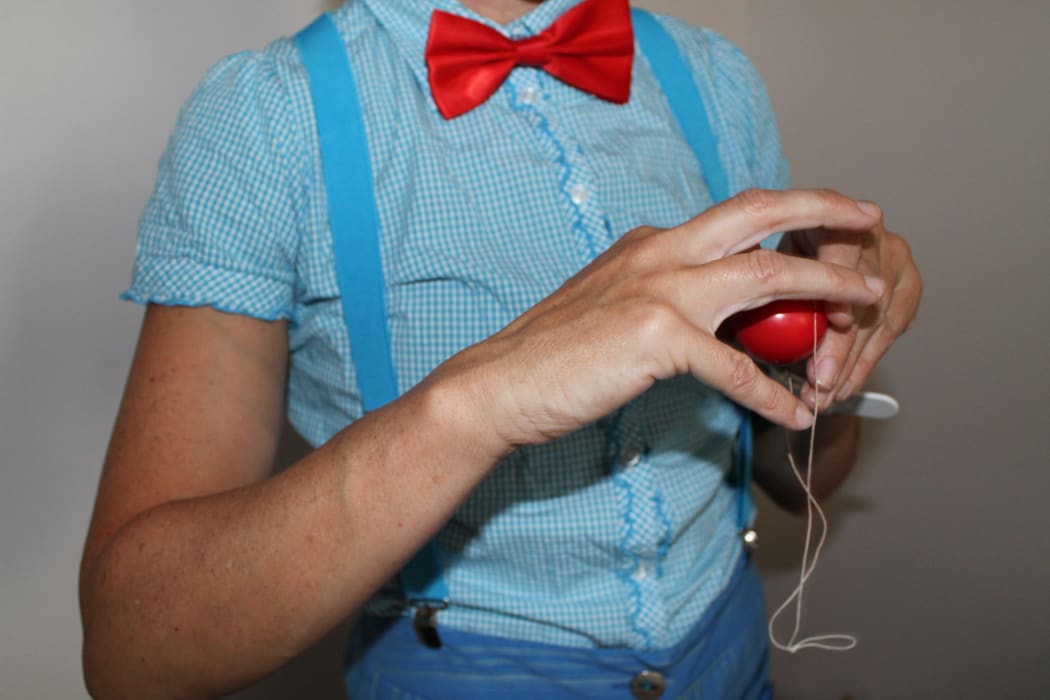 A photo of a red nose, a key clown accessory