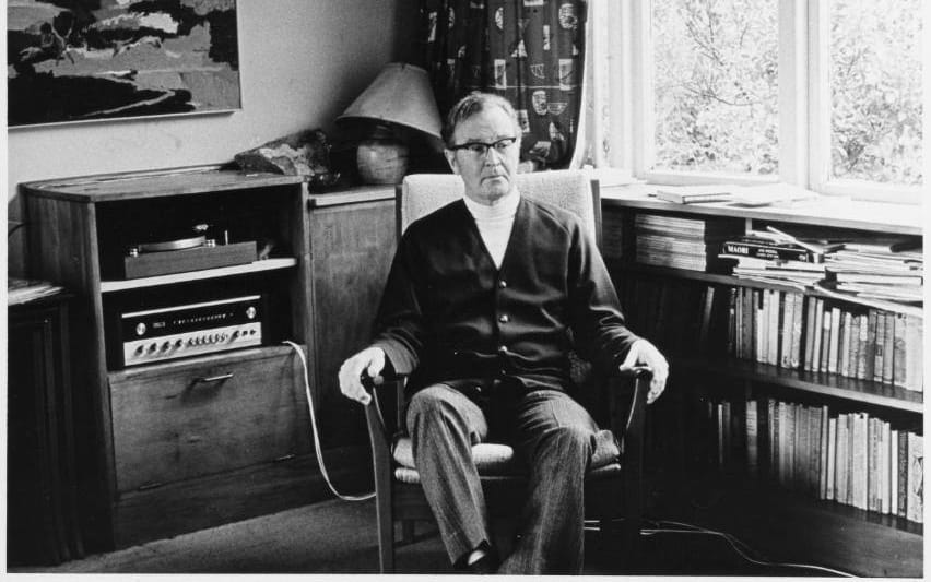 Douglas Lilburn in the sitting room of his home at 22 Ascot Terrace, Thorndon, Wellington, circa 1970.