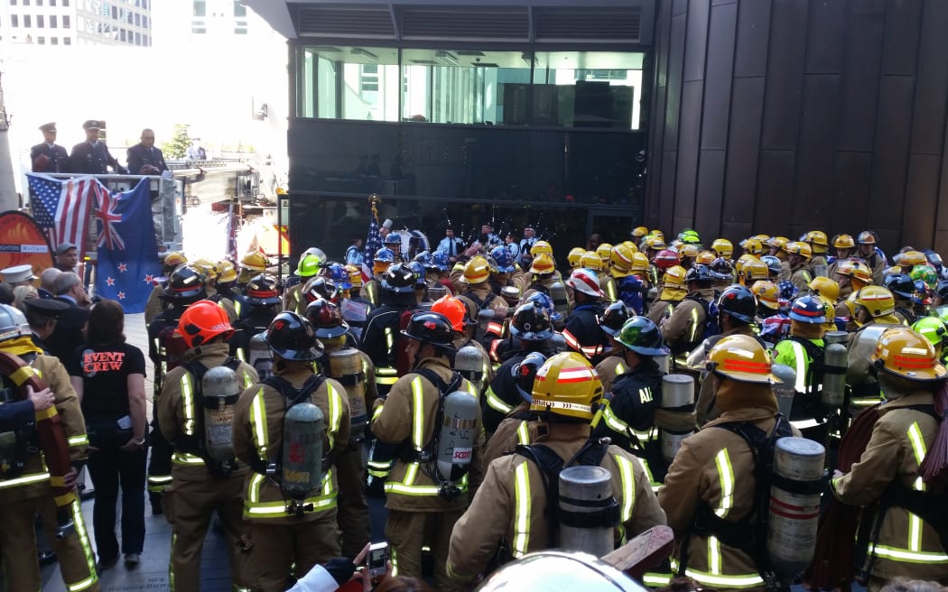 About 160 firefighters gathered to climb Auckland's Sky Tower in commemoration of the firefighters who died during 9/11.