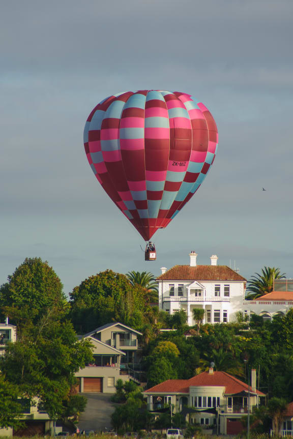 Hot air balloons float above Hamilton as part of Balloons Over Waikato 2010.