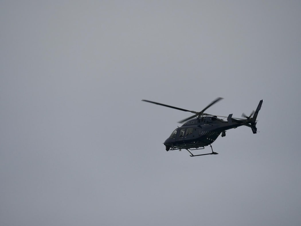 Searches are being carried on the water and from the air for a fisherman missing at O'Neill's Bay, near Bethell's Beach on Auckland's west coast.