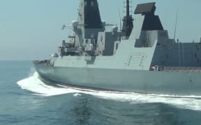 British Navy's Defender destroyer sails in the Black Sea near the Cape Fiolent in Crimea.