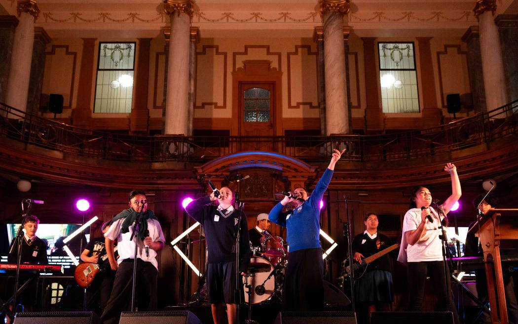 Sweater Weather in Parliament's Legislative Council Chamber. They are from Rangikura school in Ascot Park, Porirua, though a few of the band are now in college.